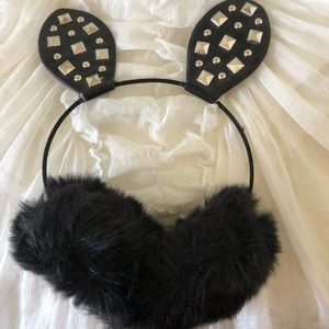 Studded/leather/faux leather/faux fur/earmuffs.